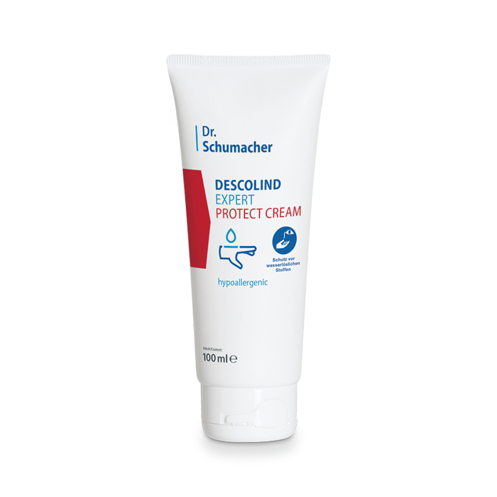 Eine weiße Tube mit der Aufschrift „Dr. Schumacher Descolind Expert Protect Cream Hautschutzcreme“ steht aufrecht und ist rot-blau gestaltet. Die Tube enthält 100 ml Produkt und weist damit darauf hin, dass es sich um eine hypoallergene Hautschutzcreme der Dr. Schumacher GmbH handelt.