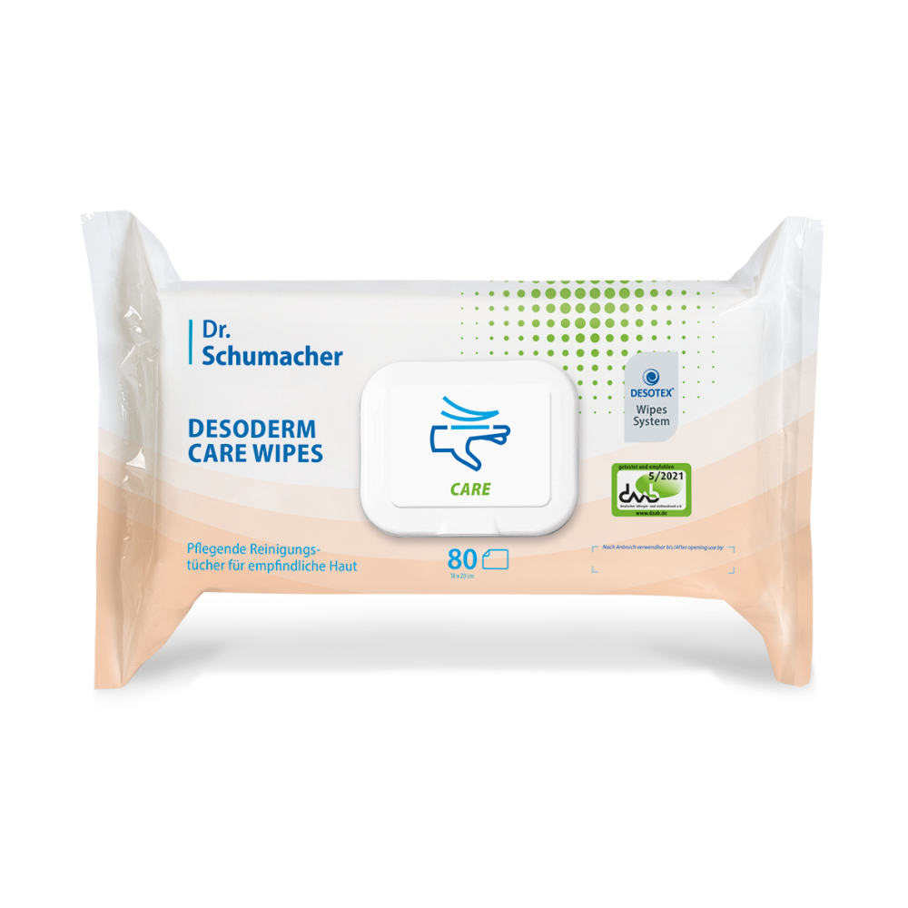 Abgebildet ist eine Packung Dr. Schumacher Desoderm Care Wipes Feuchttücher der Dr. Schumacher GmbH. Die weiße Packung enthält 80 pflegende Feuchttücher und ist mit einem grünen Pflegesymbol, dem Markennamen und einem blau-grünen Farbschema versehen. Die Packung hat einen wiederverschließbaren Deckel.