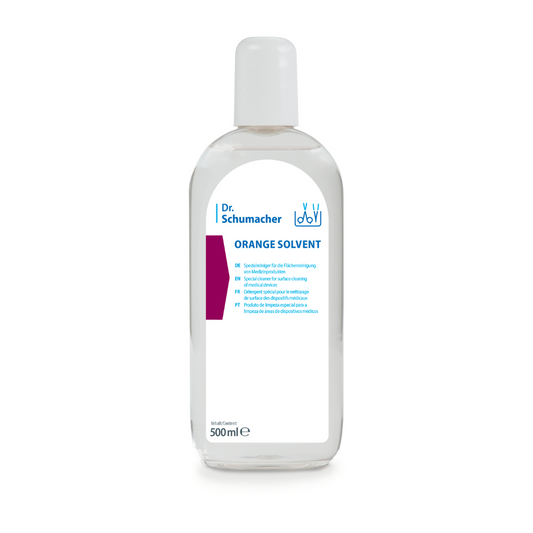 Eine 500-ml-Flasche Dr. Schumacher Orange Solvent Instrumentenreiniger - 500 ml | Flasche der Dr. Schumacher GmbH hilft Ihnen dabei, hartnäckige Rückstände von medizinischen Instrumenten effizient zu entfernen. Die transparente Flasche mit weißem Verschluss und ausführlichem mehrsprachigem Etikett zeigt den Produktnamen deutlich sichtbar auf dem Etikett.