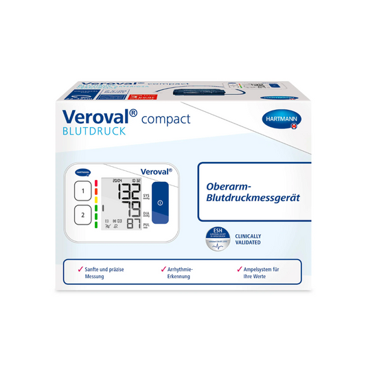 Eine Verpackung des Blutdruckmessgeräts Veroval® Compact von Paul Hartmann AG mit dem auf der Verpackung abgebildeten Gerät, das eine digitale Anzeige der Blutdruckwerte zeigt. Der Text ist auf Deutsch und betont Sicherheit und Präzision.