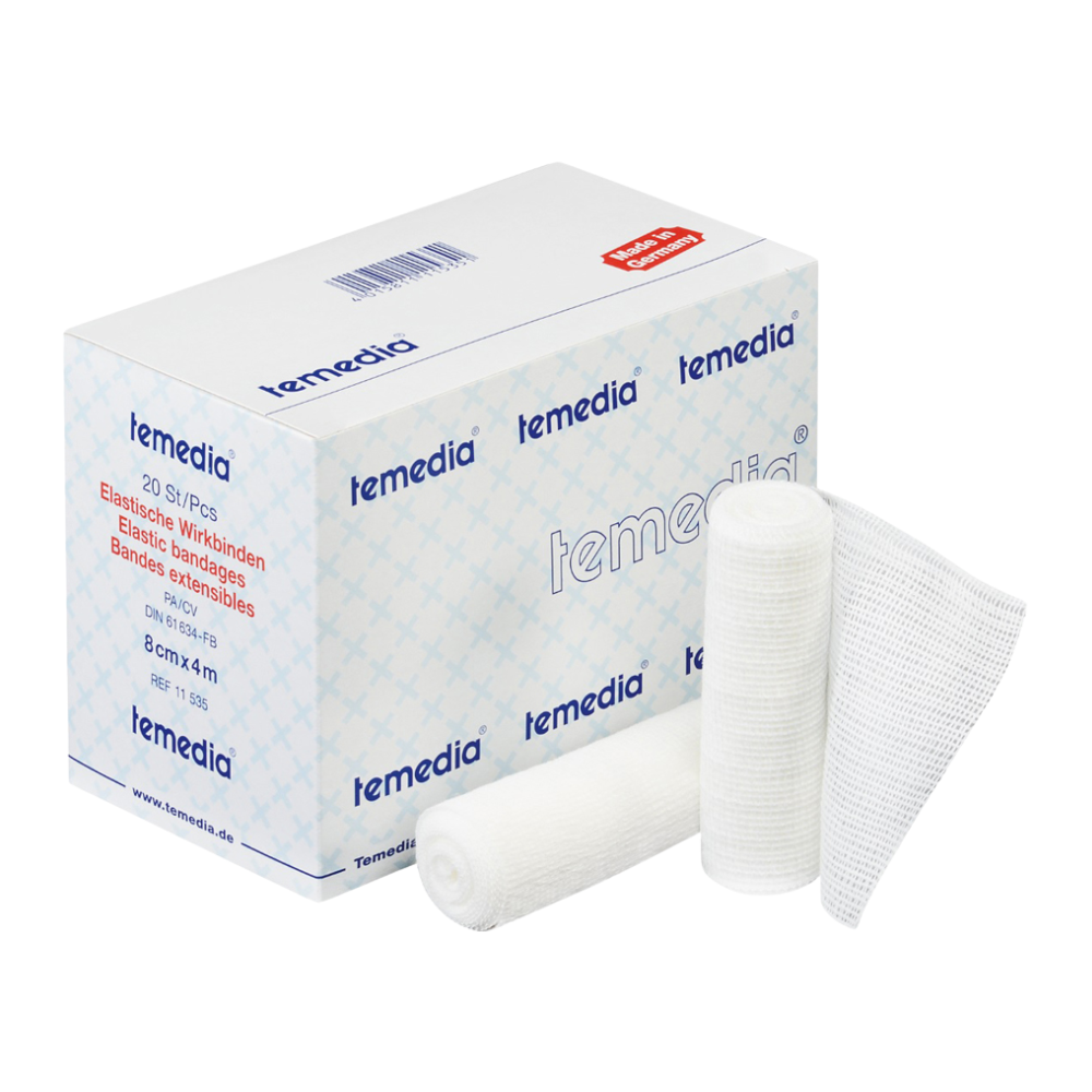 Eine Schachtel Holthaus Temedia® Wirkbinde, 10 cm x 4 m | Packung (20 Stück) von Holthaus Medical GmbH & Co. KG wird ausgestellt, wobei der Produktname und die Details auf der Verpackung sichtbar sind. Daneben befinden sich zwei gerollte elastische Binden und ein entfaltetes Stück Gaze. Die Verpackung ist blau-weiß gestaltet, mit rotem Text, der die medizinischen Produktspezifikationen angibt.