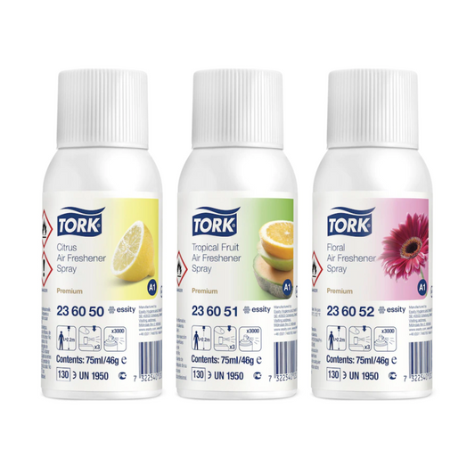 Drei Flaschen Tork 236056 Lufterfrischer Spray im Mixed Pack | Karton (12 Packungen) sind in einer Reihe abgebildet und mit den Etiketten Citrus, Tropical Fruit und Floral versehen. Jede 75-ml-Flasche zeigt Produktdetails wie Artikelcodes, Barcodes und Sicherheitssymbole. Erleben Sie langanhaltende Frische mit TORK Lufterfrischer Spray für eine effektive Geruchsneutralisierung.